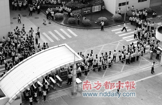 科技时代_佳能珠海工厂数百工人抗议降薪